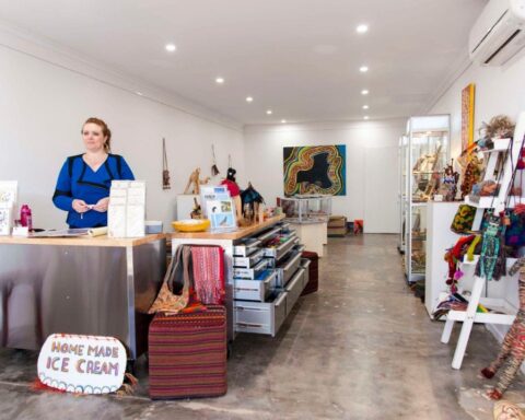 Lady serving in a shop in Todd Mall