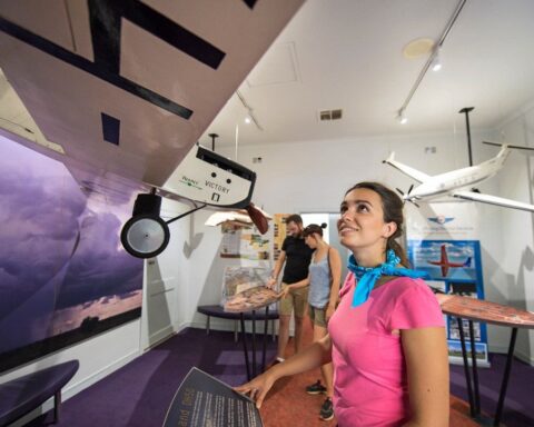 Tourists enjoying the Royal Flying Doctor Service Museum in Alice Springs