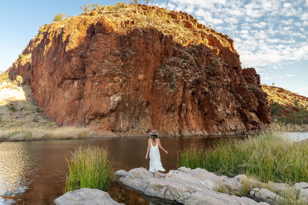 round Glen Helen is spectacular - a towering sandstone wall is the first thing you see as you arrive. The area includes views of Mount Sonder, one of the highest points in Central Australia, which changes colours with the light.