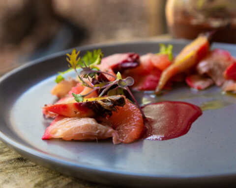 Dining at Saltbush Restaurant in the Alice Springs region.